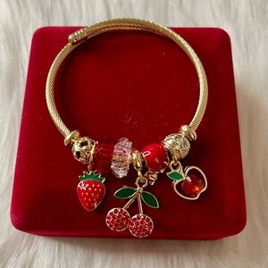 Gold and Red Charm Bracelet